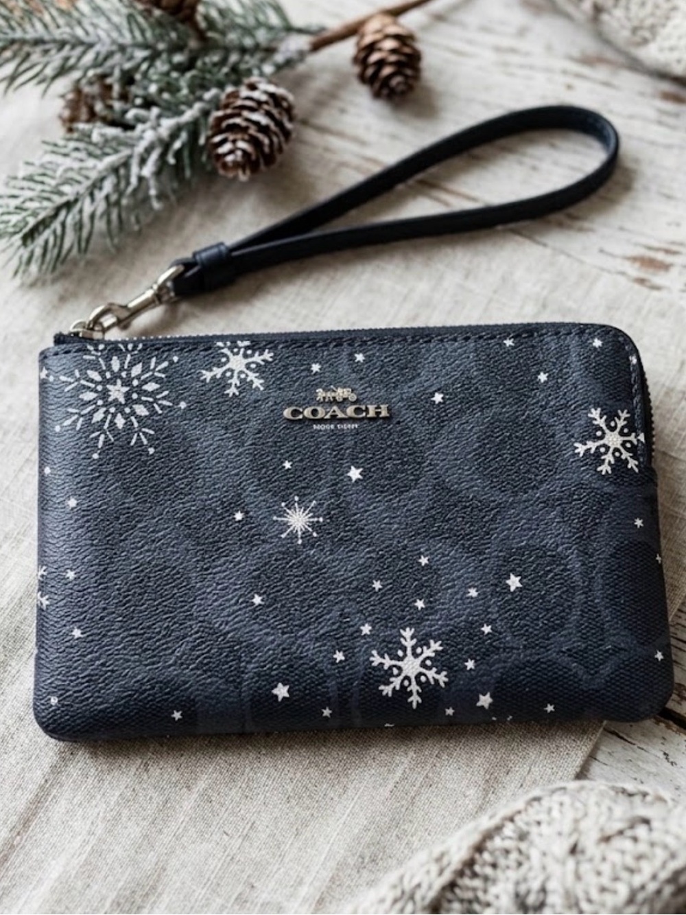 COACH Winter Snowflake Canvas Corner Zip Wristlet